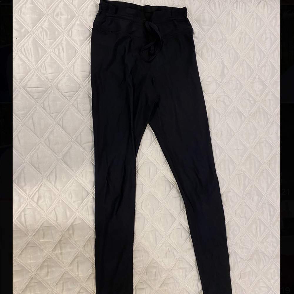 The upside. Black leggings with tie detail.